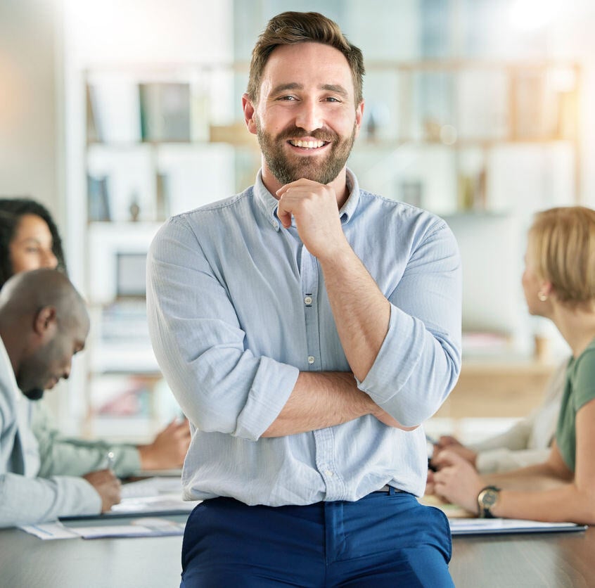 Superstar leader with team at conference table