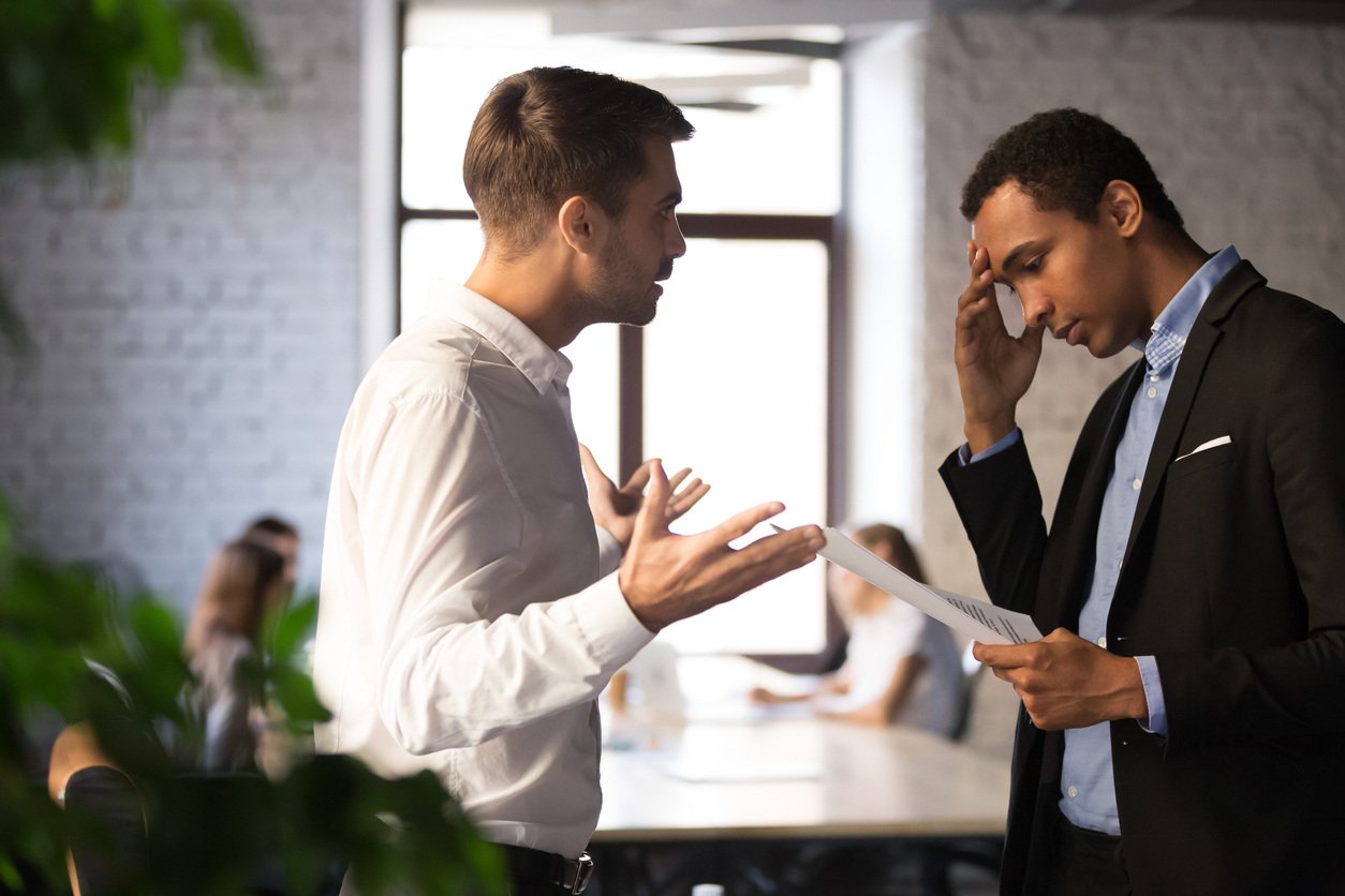 Frustrated manager yelling at employee