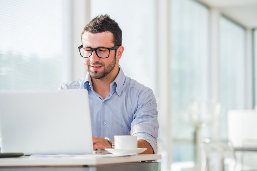 Person using AI on his laptop to develop his emotional intelligence