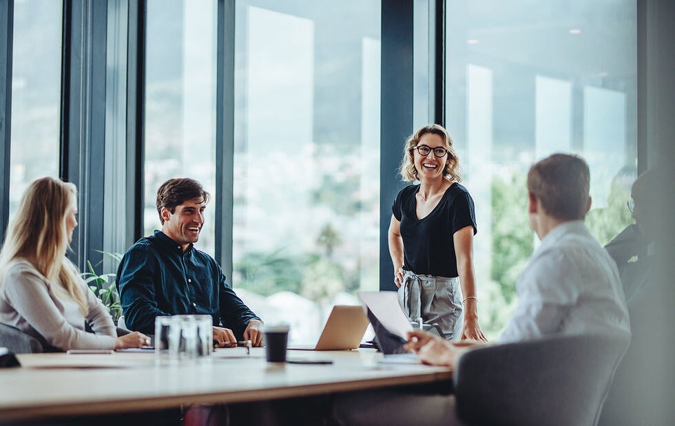 Work team smiling during meeting